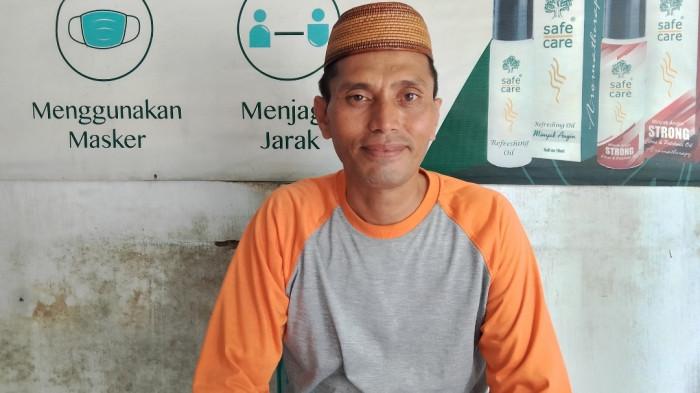 PROFIL LURAH — Sosok Ramlan Amrain saat ditemui TribunGorontalo.com di Apotek Mitra, Sabtu (28/2/2026). Ramlan resmi menjabat sebagai Lurah Tenilo.