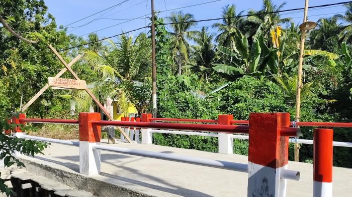 jembatan di Desa Modelomo