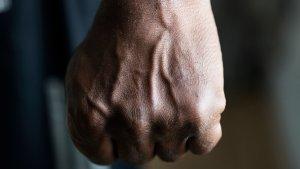 closeup-black-hand-fist_53876-40987jpg.jpg