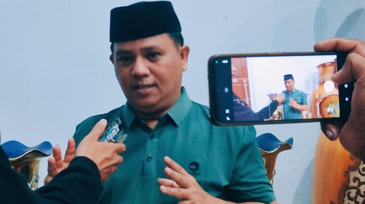 Juru-bicara-dan-kuasa-hukum-pasangan-Ismet-Mile-dan-Risman-Tolingguhu-Fanly-Katili.jpg