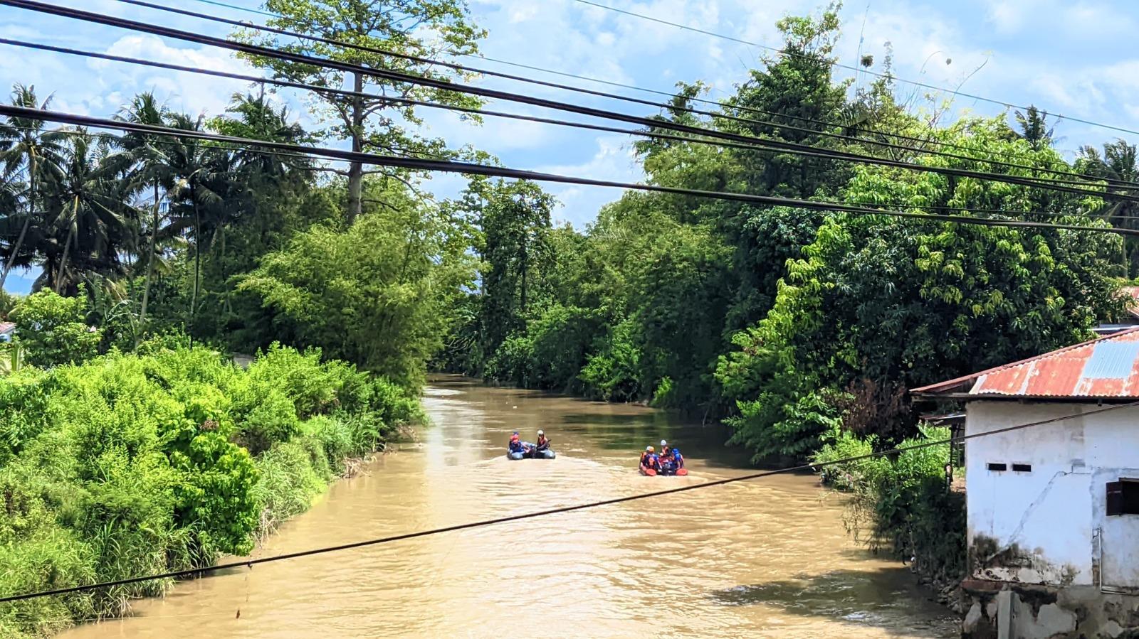 Potret-Sungai-Bulango-Saat-Tim-SAR-Melakukan-Pencairan-Korban-Tenggelam-bxcv.jpg
