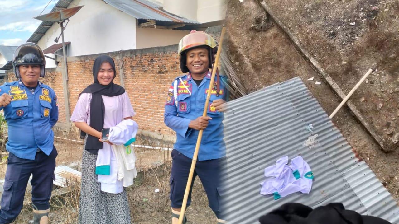 Puspita-minta-bantuan-Damkar-karena-kesulitan-mengambil-pakaian.jpg