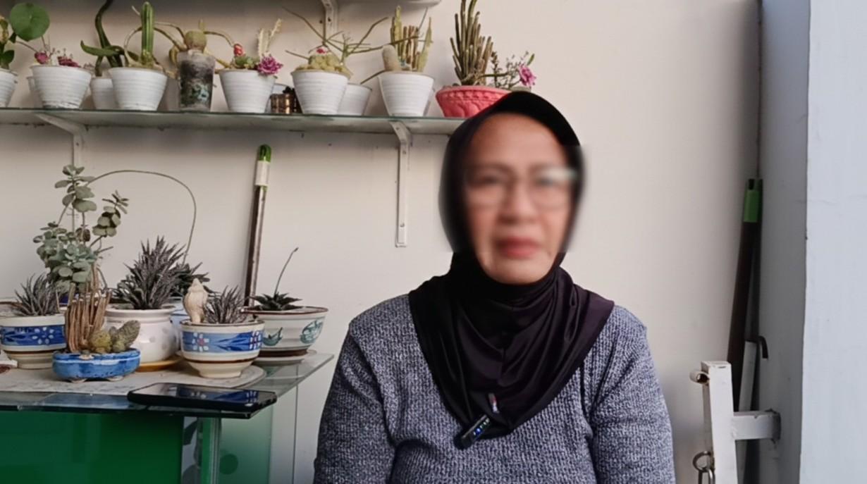 R-orang-tua-siswa-SMA-di-Kota-Gorontalo-saat-diwawancarai-TribunGorontalocom.jpg