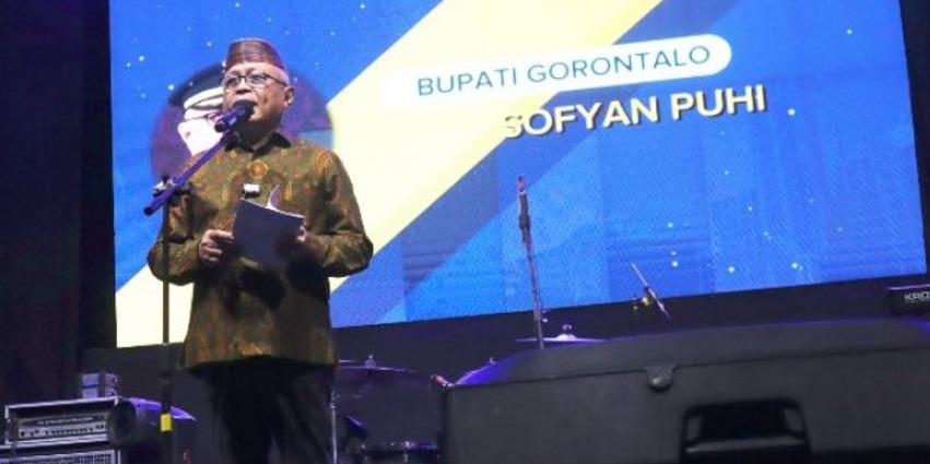 Sofyan-Puhi-saat-memberikan-sambutan-di-malam-puncak-HKN-2025.jpg