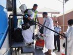 1262023_JCH-Kloter-26-UPG-menaiki-bus.jpg