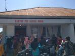 2024-02-09_Potret-warga-menerima-Program-PKH-uang-tunai-di-Kantor-Pos-Marisa.jpg