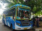 Bus-bertarif-murah-sedang-menunggu-penumpang-di-Kota-Gorontalo.jpg