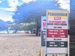 Potret-daftar-tarif-Pantai-Kurenai-di-pintu-masuk.jpg
