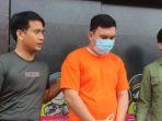 Richard-Ering-saat-ditahan-kepolisian-Bone-Bolango-Gorontalo-beberapa-waktu-lalu.jpg