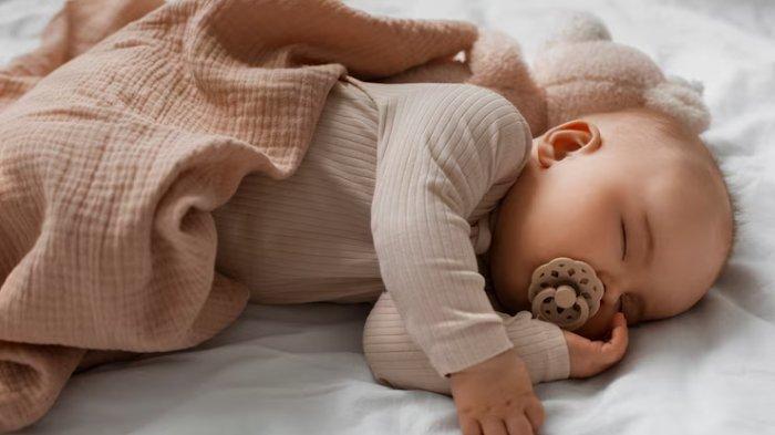 Ilustrasi bayi tidur nyenyak, berikut ini tips untuk membuat bayi tidur lebih nyenyak di malam hari