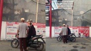 viral-petugas-parkir-tahan-pengunjung-minimarket.jpg