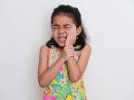ilustrasi-gigi-goyang-pada-anak.jpg