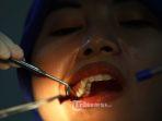 ilustrasi-scaling-gigi-oleh-dokter-gigi.jpg