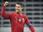 penyerang-portugal-cristiano-ronaldo-merayakan-gol-pembuka-gol-ke-100nya-untuk-portugal.jpg