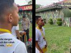 seorang-pemuda-bernama-muhammad-iqbal-mengikuti-tes-seleksi-polri-menggenakan-baju-lusuh-dan-sobek.jpg