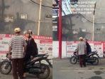 viral-petugas-parkir-tahan-pengunjung-minimarket.jpg