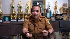 Kepala-Dinas-Pertanian-dan-Ketahanan-Pangan-Kabupaten-Karawang-Rohman-adv.jpg