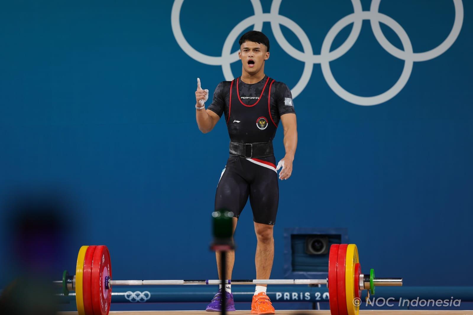 Lifter-andalan-Indonesia-Rizki-Juniansyah-berhasil-menyumbangkan-medali-emas.jpg
