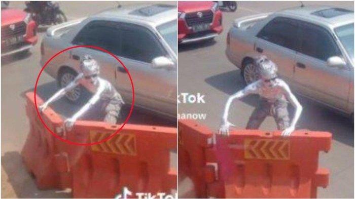 Viral-Aksi-Manusia-Silver-di-Depok-Sigap-Membantu-Mobil-Ambulans-Bawa-Jenazah-Lewat.jpg