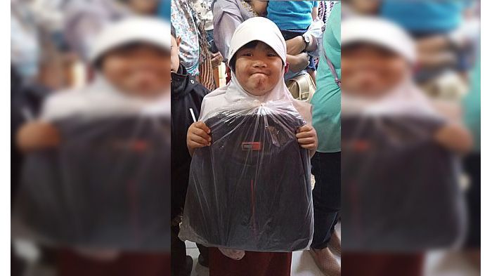 azka-10-penyandang-down-syndrome-dapat-bantuan-bakti-sosial-ykkjrk-dan-padma.jpg