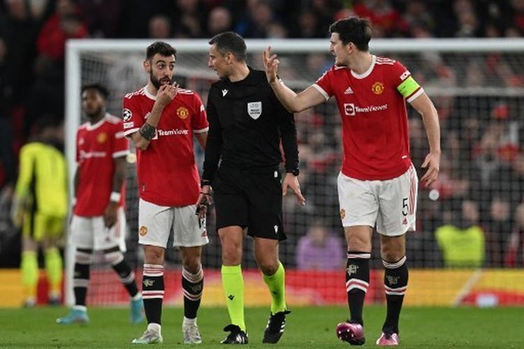 bruno-fernandes-dan-harry-maguire_manchester-united-vs-atletico-madrid.jpg