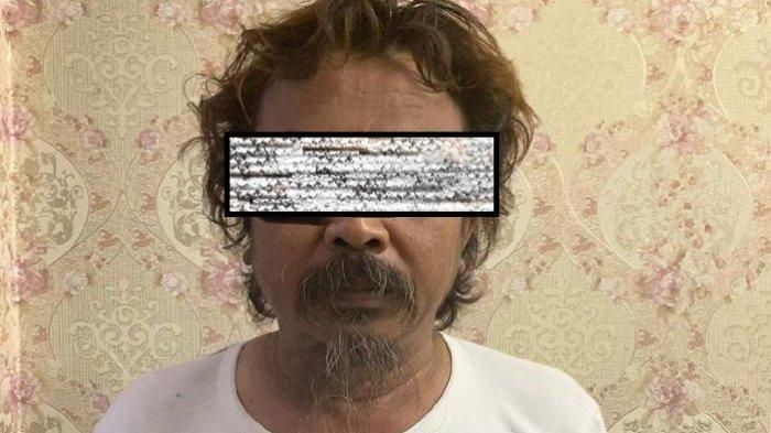 hendrianto-54-sopir-taksi-online-terduga-pelaku-rudapaksa-terhadap-seorang-perawat.jpg
