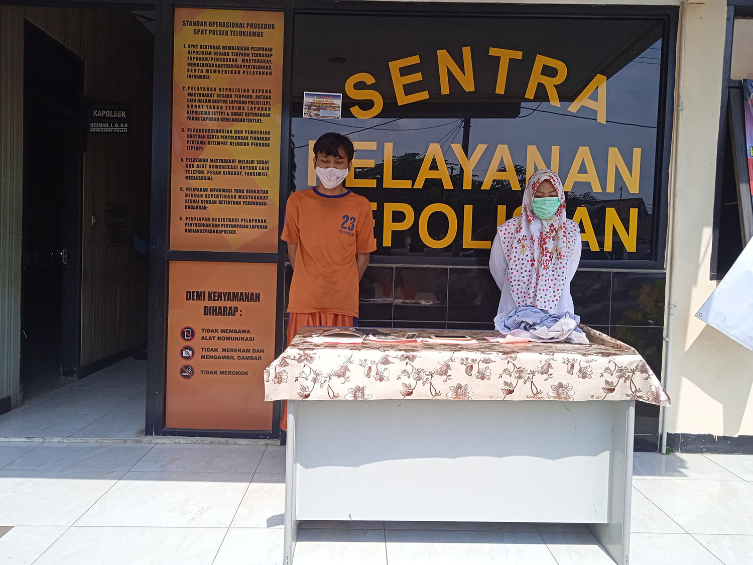 suami-istri-rampok-taksi-online.jpg