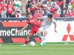 Asnawi-Mangkualam-vs-Doan-Van-Hau_Timnas-Indonesia-vs-Vietnam.jpg
