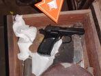 Barang-bukti-pistol-FN-yang-diduga-digunakan.jpg