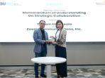 Foto-1-Direktur-Group-Business-Development-Telkom-Honesti-Basyir-kiri-dan-Head-of-Zoo.jpg