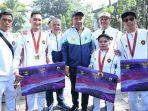 Hikmat-Ramdani-23-atlet-para-bulu-tangkis-asal-Tasikmalaya-kedua-kiri.jpg
