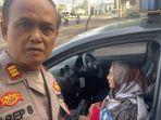 Kepala-Pos-Terpadu-AKP-Asep-Saefulloh.jpg