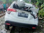 Kondisi-mobil-HR-V-BK-1188-RN-warna-putih-seusai-ditabrak.jpg