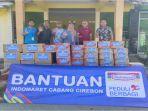 Kuwu-Desa-Cilengkrang-Bapak-Suhardi-berbaju-merah-menerima-bantuan-Sembako.jpg