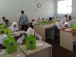 Makan-Bergizi-Gratis-MBG-di-SMPN-12-Kota-Sukabu.jpg