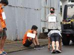 Mario-Dandy-duduk-saat-menyuruh-David-push-up-terlihat.jpg