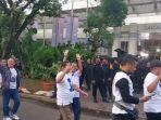 Salam-4-jari-pendukung-Paslon-01-ke-03.jpg