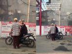 jabar/Viral-Wanita-Pengendara-Motor-Ditahan-Tukang-Parkir-di-Minimarket.jpg