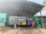 Water-Canon-Polres-Cimahi-saat-diterjunkan-bantu-suplai-air.jpg