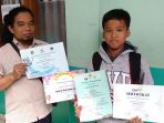 ardiansyah-13-dan-ayahnya-sudiarto-43-ppdb-lewat-prestasi-angklung_20170607_170031.jpg
