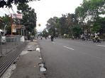arus-lalu-lintas-di-jalan-ahmad-yani-terpantau-lengang-minggu-1102017_20171001_134806.jpg