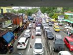 arus-lalulintas-di-jalan-raya-puncak-cianjur_20170627_130003.jpg