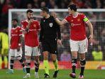 bruno-fernandes-dan-harry-maguire_manchester-united-vs-atletico-madrid.jpg
