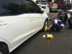 dishub-gembok-mobil-parkir-sembarangan_20170907_135848.jpg