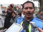 endang-suhendar-54-koordinator-aksi-dorong-motor_20171127_143931.jpg