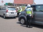 ilustrasi-polisi-lalu-lintas_20180415_183011.jpg