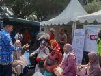 kepala-disdukcapil-tatang-muchtar-saat-memberikan-imbauan-ke-pemudik.jpg