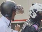 menteri-amran-naik-motor.jpg