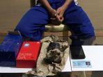 pelaku-dan-ganja-kering-seberat-1164-gram-yang-berhasil-diamankan.jpg