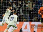 pemain-depan-real-madrid-asal-prancis-karim-benzema-kiri-merayakan-gol.jpg